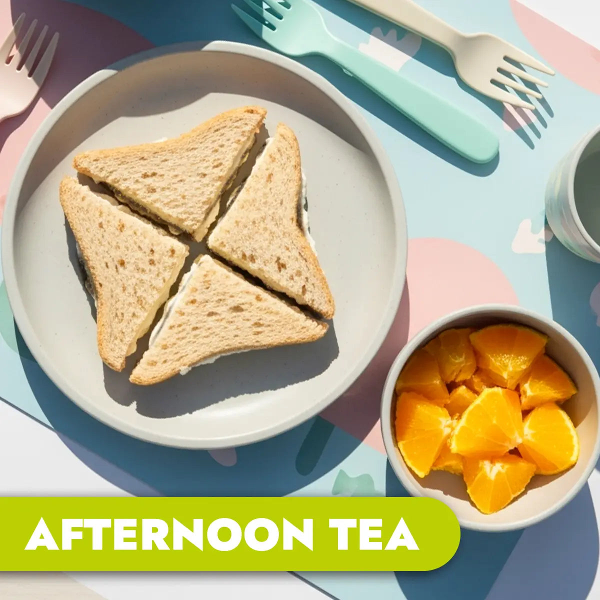 Four triangular sandwiches on a plate with a bowl of orange slices and 'Afternoon Tea' text on a colorful background.